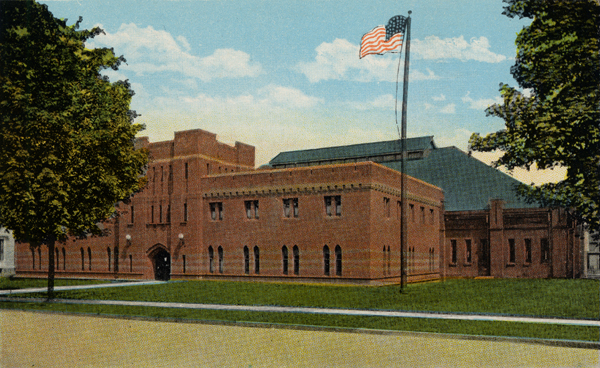 Postcard of Olean Armory with new administration building