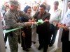 LTC Michael Hoblin, Civil Military Affairs Officer for CJTF Phoenix joins with Afghan Minister of Education Abdul Rasoul Amin to cut the ribbon for the new wing of the Tajwar Girls School.