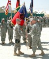 Major General Robert Cone (at right) commander of Combined Security Transition Command-Afghanistan presents the 27th Brigade Combat Team Colors to its commander as the incoming commander of Combined Joint Task Force Phoenix VII during the Transition of Authority ceremony at Camp Phoenix, Kabul, Afghanistan on Saturday 26 April 2008.  Also in the photo is Command Sergeant Major David Piwowarski. U.S. Army photo by CPT Robert Romano, Combined Joint Task Force Phoenix. (Released)