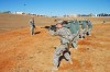 SSG Eric Dieumegard of SECFOR Charlie, Co B 69th Infantry, from Bayshore, Long Island leads a section on reflex fire practice