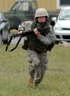 Sgt. Christine Cullinan, a member of the 27th Brigade Combat Team trains at Fort Drum during their June 2007 annual training. The 27th will be deployed to Afghanistan in January of 2008