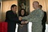 Lieutenant Colonel Michael Hoblin presents City of Kabul Director of Education Najibullah Kamran with the keys to the Tajwar Sultana School�s front door during the opening ceremony for the school�s new wing October 20, 2008.
