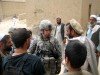 LTC Michael Hoblin, CJTF Phoenix J9 Civil Military Affairs Officer conducts a key leader engagement with local residents of an Afghan village.