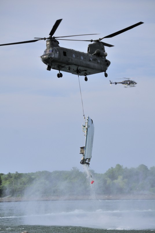 Army Guard CH-47 Gives Lift to Park Police Boat
