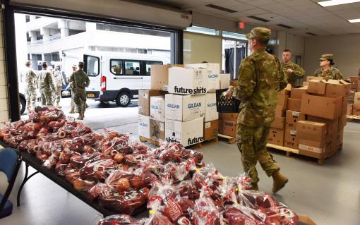Soldiers distributing food in Albany County