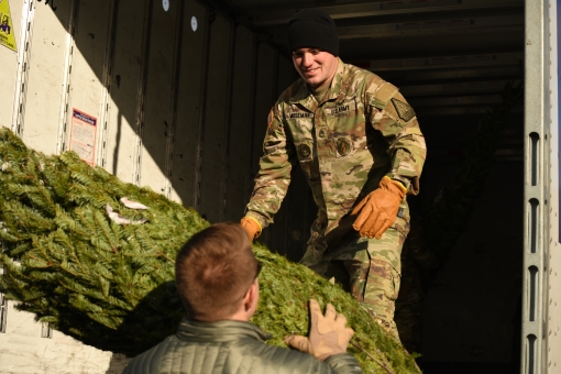 Guard members help with Trees for Troops 