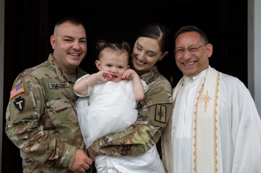 Guard parents baptize daughter at Camp Smith 