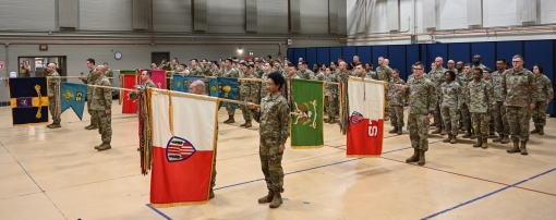 Soldiers salute during ceremony 