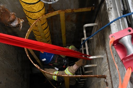 Firefighters conduct confined space training 