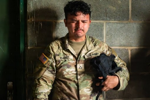 Soldier trains with protective mask 