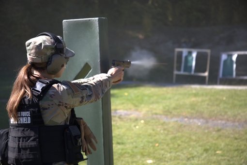 Airman qualifies on pistol at Camp Smith 
