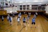Airmen play volleyball with Students