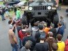 Students Checkup a Humvee