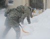 Airmen Dig Out After Storm