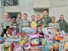 MIlitary Force members pack Christmas toy