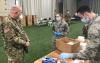 Airmen, Soldiers Assemble COVID-19 test kits 