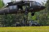 Soldiers train on helicopter cargo sling loading 