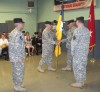 COL Brian Farley (center) passes the 10th Brigade colors to the New York Guard’s Chief of Staff, COL Larry Bishop, who will then pass the colors to COL David Molik (right) the new commander of the 10th Brigade, New York Guard. Sergeant Major Thomas Czurlanis (left)  first presented the colors to COL Farley.  Passing the Colors represents the orderly transition of command within a military unit, as officers move on to other assignments.