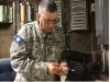 New York Guard 1st Sgt. Mark Copeletti, 56th Brigade, from New Windsor, N.Y., performs an equipment check on a Military Emergency Radio Network receiver at the Joint Task Force Sandy operations center Nov. 6, 2012. The MERN provides back-up communication capabilities for the National Guard response to emergencies such as Superstorm Sandy. 
Photo by Sgt. 1st Class Dave Konig, 56th Brigade, New York Guard.
