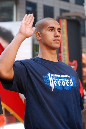 The New York Army National Guard&rsquo;s latest enlistee, Private Joseph Rios, 19, receives his oath of enlistment from Army Training and Doctrine Command commander General William Wallace in Times Square, New York City on October 1. Rios joined eight other Soldiers for the Army&rsquo;s milestone ceremony to mark the achievement of Army, Army Reserve and Army National Guard recruiting goals for the 2008 fiscal year. U.S. Army photo by Spc. Errol Cadet.