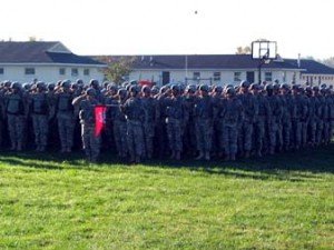 Members of the Massachusetts Army National Guard&rsquo;s 101st Engineer Battalion Forward Detachment (Whitinsville, Mass.) salute while in mass formation with the rest of Task Force Military Police during the arrival of the official party at the Kosovo Force Eight Multinational Task Force-East departure ceremony in Camp Atterbury, Ind., Sunday. 
Photo by: Maj. Winfield Danielson, Mass. National Guard Public Affairs 