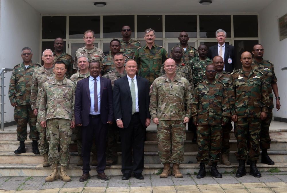
                Leaders from the Ethiopian National Defense Force, the U.S., and other global partners posed for a group photo following the opening ceremony of exercise Justified Accord 2019 at the Peace Support Training Center in Addis Ababa, Ethiopia, July 15, 2019. JA19 is a U.S. Army Africa-led exercise designed to enhance the capacity and capability of participating international staff and forces in peacekeeping operations in support of the African Union Mission in Somalia. (U.S. Army photo by Sgt. Ian Valley)            