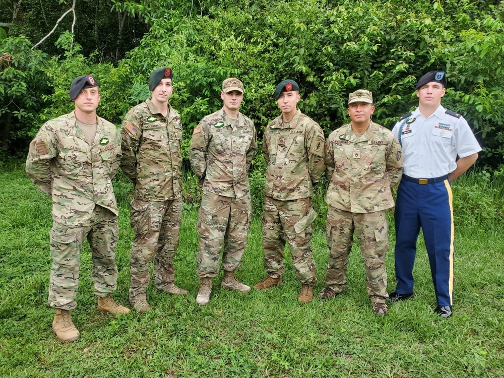 
                Tech. Sgt. Paul Cange, far left, and Cpl. Dakoatah Miller, far right, join the other American graduates for the Brazilian Jungle Operations International Course after the completion of the course in Manuas, Brazil, on Nov. 11, 2021. Brazil’s Jungle Warfare Center, known as CIGS, the abbreviation for it’s Portuguese name of Centro de Instruçao de Guerra na Selva, conducts a special shortened course for foreign students each fall. (Courtesy photo)            