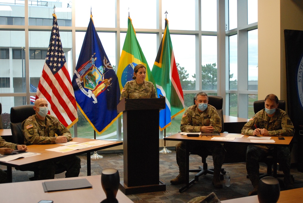 
                Maj. Amy Crounse, New York National Guard State Partnership Program officer, begins a Zoom call with representatives from Brazil to discuss how the two sides responded to COVID-19, New York National Guard Headquarters, Latham, N.Y., Sept. 29, 2020. The call was aimed at discussion what worked best when handling the pandemic and how New York and Brazil can continue to work together on the issue. (U.S. Army National Guard photo by Ryan Campbell)            