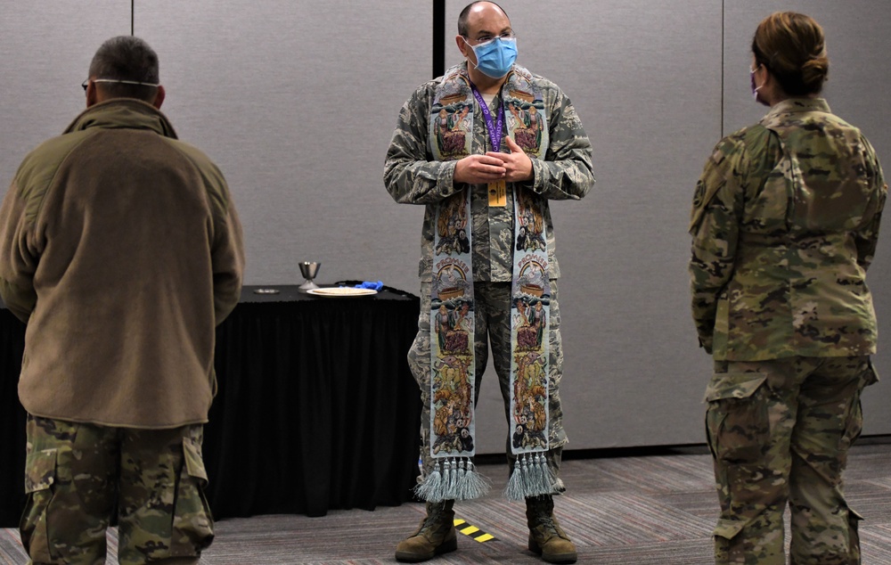 
                New York Air National Guard Chaplain (Lt. Col. ) Jacob Marvel conduct Easter Mass for service members at the Javits Convention Center in New York City while following social distancing guidelines on April 12, 2020. New York Army and Air National Guard chaplains, like their counterparts in the South African National Defence Force are focused on providing religious opportunities and counseling to troops involved in efforts to contain the COVID-19 pandemic. ( U.S. Air National Guard photo by Major Patrick Cordova)            