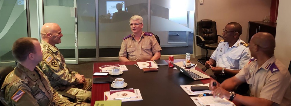 
                New York National Guard Chaplains Major Timothy Miller (far left) and Lt. Col. Scott Ehler ( left) meet with South African Chief Chaplain Col. R. Stanton, the South African National Defence Force Human Resources Director ( center) and other South African chaplains Lt. Col. S.E.E. Loate and  Col. Z.A. Makalima during a meeting in Pretoria, South Africa on Nov. 25, 2019. The New York National Guard and the South African National Defence Force have has a National Guard State Partnership Program relationship since 2003. ( U.S. Army National Guard photo by Lt. Col. Al Phillips)            