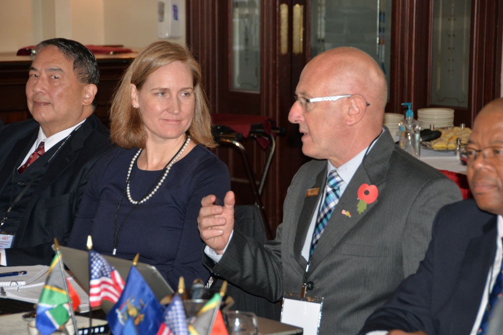 
                U.S. Acting Acting Deputy Secretary for the Assistant Secretary of Defense for African Affairs Michelle Lenihan discusses training and exchange highlights with Republic of South Africa Chief Director for Defense Policy Nick Sendall on November 6 during the 2018 Defense Committee meeting with South Africa at Fort Hamilton, N.Y. The group met November 6-8 to plan military exchange opportunities for the coming year. The New York National Guard, as the State Partnership Program partner for South Africa, hosted the event. U.S. National Guard photo by Col. Richard Goldenberg.            